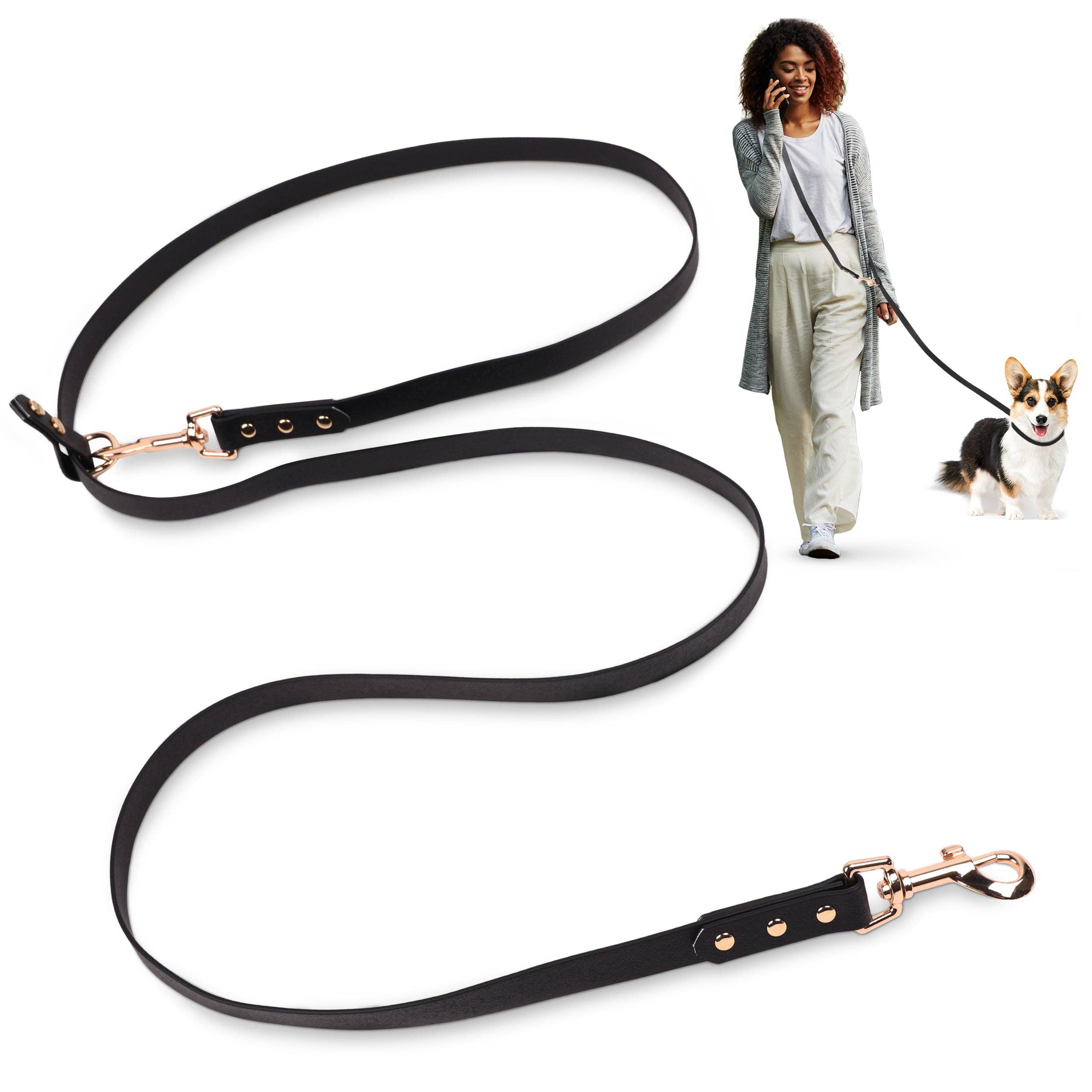 The Tank hands-free dog leash in black, worn crossbody while walking a corgi