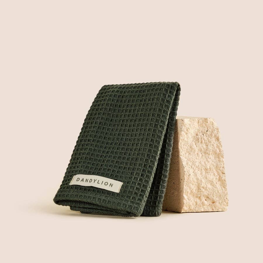 Dandylion Paw Towel in green, 100% cotton waffle weave, folded